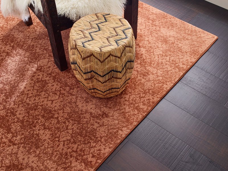 Chair on rug from Cornerstone Flooring Brokers Sun City in Sun City
